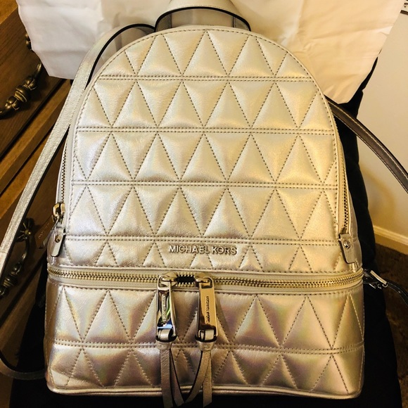 Silver Micheal Kors backpack. - Picture 2 of 5